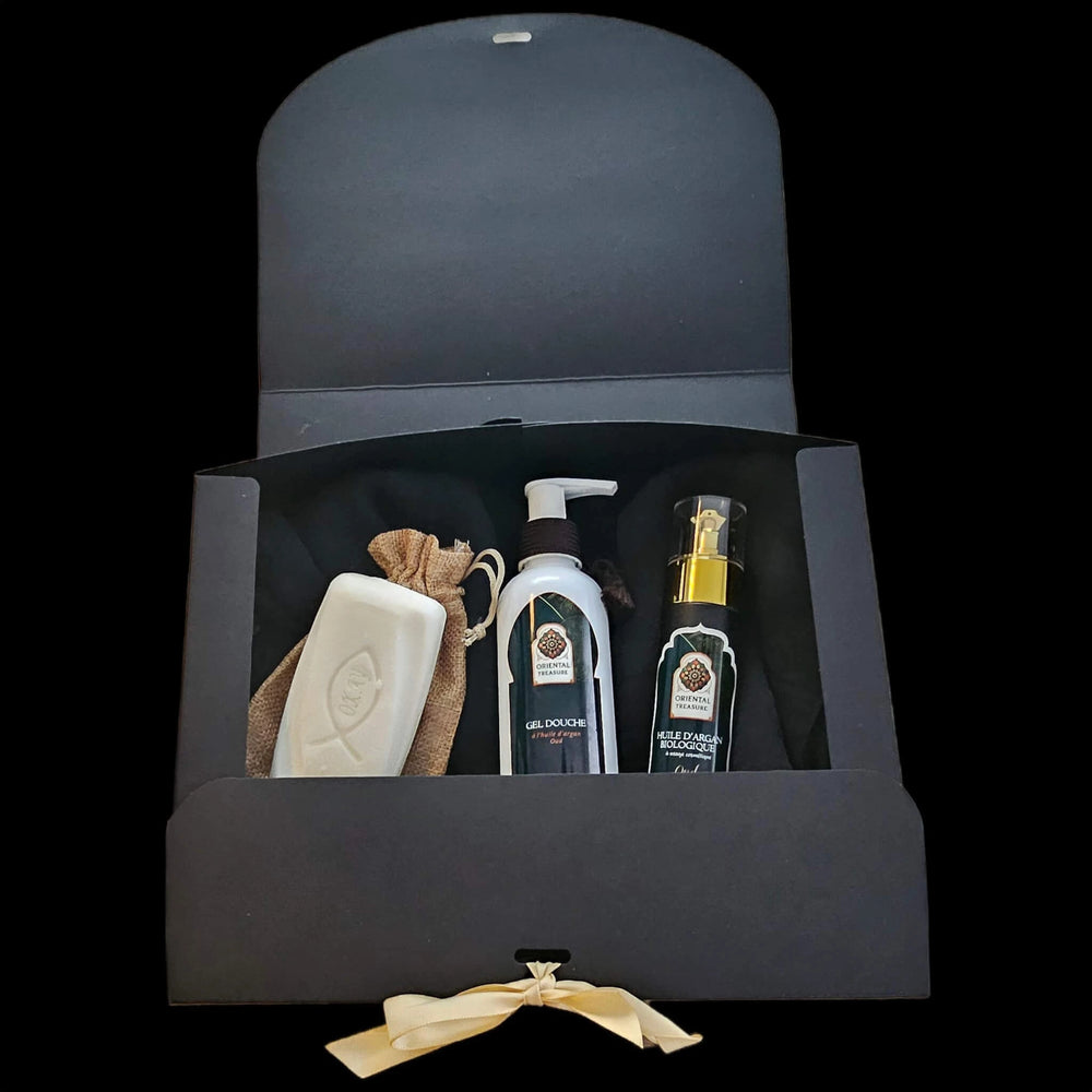 Coffret cadeau pour grand pere contenant : une huile au Oud, un gel douche argan et oud, un savon au lait de chamelle