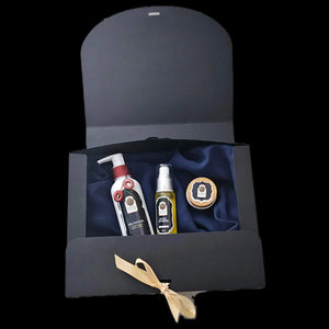 Coffret cadeau pour homme contenant : une crème anti cernes, un gel douche à l'argan ambre et musk, une huile de barbe