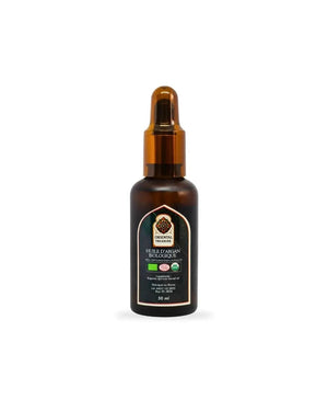 Huile d'argan Bio dans un flacon ombragé avec une pipette pour une application précise
